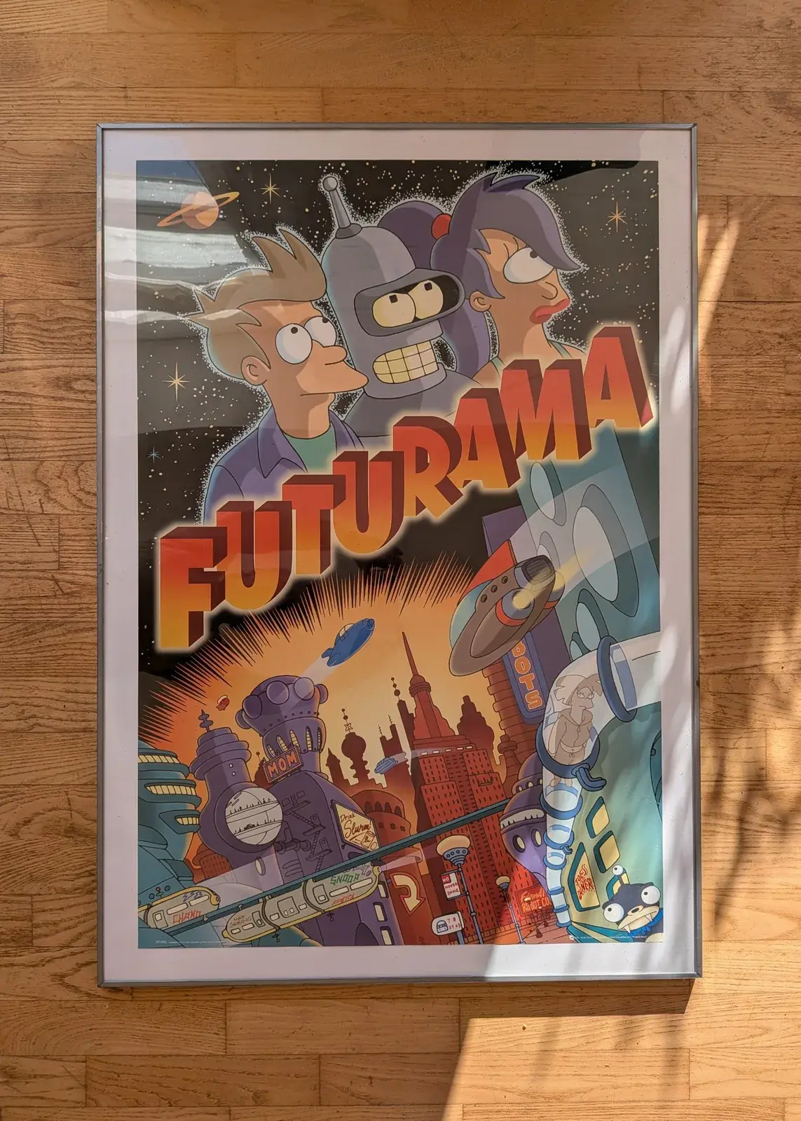 Futurama-plakat i metalramme